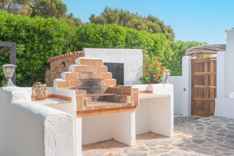 Can Petit's built-in brick barbecue set into a whitewashed garden wall